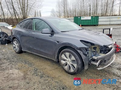 Czwarte zdjęcie samochodu z boku: 2024 TESLA MODEL Y VIN:7SAYGAEE3RF036372 - miniatura