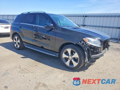 Czwarte zdjęcie samochodu z boku: 2016 MERCEDES-BENZ GLE 350 VIN:4JGDA5JB0GA695401 - miniatura