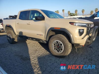 Czwarte zdjęcie samochodu z boku: 2023 GMC CANYON AT4X VIN:1GTP6EEK6P1209817 - miniatura