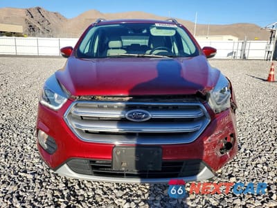 Piąte zdjęcie samochodu w środku: 2017 FORD ESCAPE TITANIUM VIN:1FMCU0J91HUB08285 - miniatura
