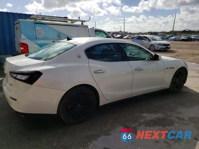 Trzecie zdjęcie samochodu z tyłu: 2014 MASERATI GHIBLI S VIN:ZAM57RTA9E1086058 - miniatura