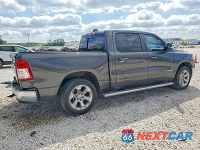 Trzecie zdjęcie samochodu z tyłu: 2020 RAM 1500 BIG HORN VIN:1C6RREFT1LN129083 - miniatura