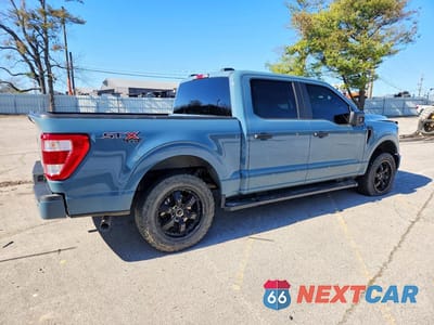 Trzecie zdjęcie samochodu z tyłu: 2023 FORD F150 SUPERCREW VIN:1FTFW1E56PKE64637 - miniatura