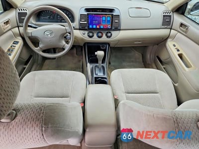 Zdjęcie 8 z 12 samochodu: 2004 TOYOTA CAMRY LE VIN:4T1BE32K54U790948 - miniatura