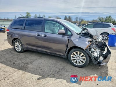 Czwarte zdjęcie samochodu z boku: 2014 TOYOTA SIENNA XLE 7-PASSENGER VIN:5TDDK3DC0ES082687 - miniatura