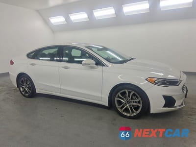 Czwarte zdjęcie samochodu z boku: 2019 FORD FUSION SEL VIN:3FA6P0CDXKR110163 - miniatura