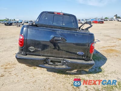 Zdjęcie 6 z 12 samochodu: 2001 FORD F150 SUPERCREW VIN:1FTRW07L31KA04121 - miniatura