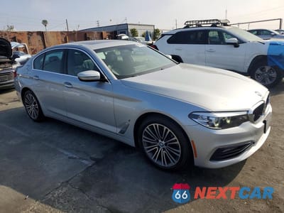 Czwarte zdjęcie samochodu z boku: 2018 BMW 530E VIN:WBAJA9C5XJB033426 - miniatura