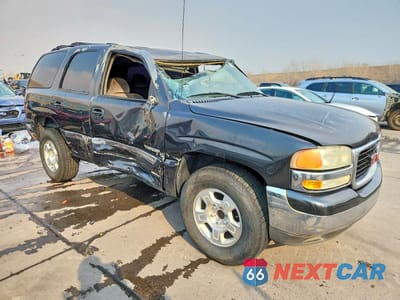 Czwarte zdjęcie samochodu z boku: 2003 GMC YUKON VIN:1GKEC13V43R281301 - miniatura