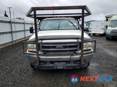 Piąte zdjęcie samochodu w środku: 2003 FORD F350 SUPER DUTY FLATBED TRUCK VIN:1FDWF36F43EA94229 - miniatura