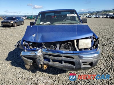 Piąte zdjęcie samochodu w środku: 1999 NISSAN FRONTIER XE-V6 VIN:1N6ED26Y1XC310537 - miniatura
