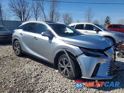 Czwarte zdjęcie samochodu z boku: 2023 LEXUS RX 350H PREMIUM VIN:2T2BBMCAXPC014854 - miniatura