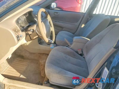 Zdjęcie 7 z 11 samochodu: 2001 TOYOTA COROLLA LE VIN:2T1BR12E21C417091 - miniatura