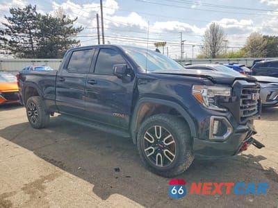 Czwarte zdjęcie samochodu z boku: 2021 GMC SIERRA K1500 AT4 VIN:1GTU9EET7MZ383167 - miniatura