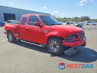 Czwarte zdjęcie samochodu z boku: 2003 FORD F150 VIN:1FTRX07W43KB91329 - miniatura