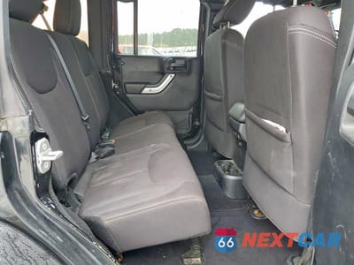 Zdjęcie 11 z 12 samochodu: 2014 JEEP WRANGLER UNLIMITED SAHARA VIN:1C4BJWEG5EL140629 - miniatura