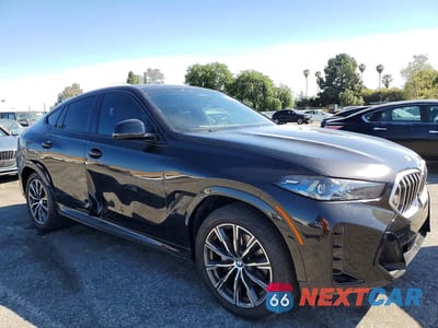 Czwarte zdjęcie samochodu z boku: 2024 BMW X6 XDRIVE40I VIN:5UX33EX00R9S41071 - miniatura