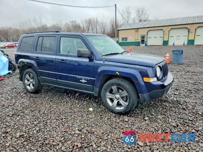 Czwarte zdjęcie samochodu z boku: 2014 JEEP PATRIOT LATITUDE VIN:1C4NJPFB9ED690609 - miniatura