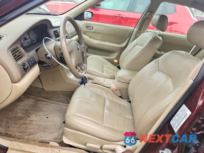 Zdjęcie 7 z 12 samochodu: 2002 MAZDA 626 ES VIN:1YVGF22F725288044 - miniatura