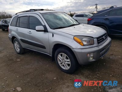 Czwarte zdjęcie samochodu z boku: 2001 TOYOTA RAV4 BASE VIN:JTEHH20V716008044 - miniatura