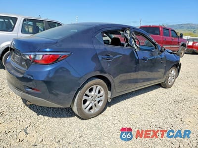 Trzecie zdjęcie samochodu z tyłu: 2017 TOYOTA YARIS IA BASE VIN:3MYDLBYV6HY191964 - miniatura