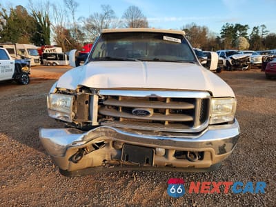 Piąte zdjęcie samochodu w środku: 2004 FORD F350 SUPER DUTY VIN:1FTWW33P54ED39297 - miniatura