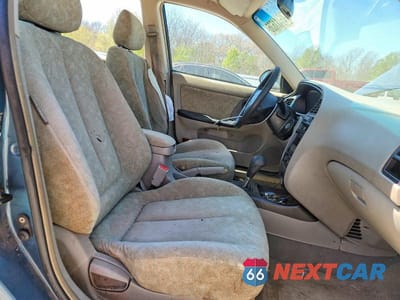 Zdjęcie 7 z 12 samochodu: 2002 HYUNDAI ELANTRA GLS VIN:KMHDN45D72U319697 - miniatura