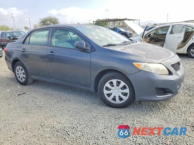 Czwarte zdjęcie samochodu z boku: 2010 TOYOTA COROLLA BASE VIN:1NXBU4EE0AZ190851 - miniatura