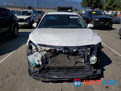 Piąte zdjęcie samochodu w środku: 2020 TOYOTA CAMRY HYBRID LE VIN:4T1C31AK8LU528792 - miniatura