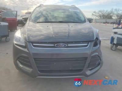 Piąte zdjęcie samochodu w środku: 2016 FORD ESCAPE TITANIUM VIN:1FMCU9JX5GUB54669 - miniatura