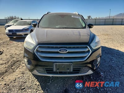 Piąte zdjęcie samochodu w środku: 2017 FORD ESCAPE TITANIUM VIN:1FMCU9J98HUE47727 - miniatura