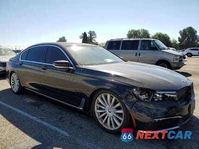 Czwarte zdjęcie samochodu z boku: 2018 BMW 740 I VIN:WBA7E2C53JG742000 - miniatura
