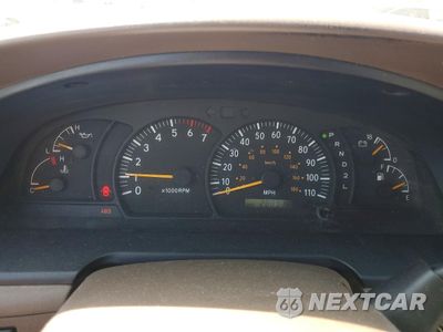 Zdjęcie 9 z 12 samochodu: 2000 TOYOTA TUNDRA LIMITED VIN:5TBBT4819YS035268 - miniatura