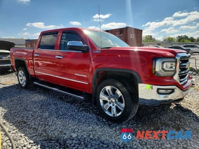 Czwarte zdjęcie samochodu z boku: 2017 GMC SIERRA K1500 SLT VIN:3GTU2NEC2HG115167 - miniatura