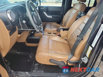 Zdjęcie 7 z 12 samochodu: 2011 JEEP WRANGLER UNLIMITED RUBICON VIN:1J4HA6H13BL585863 - miniatura