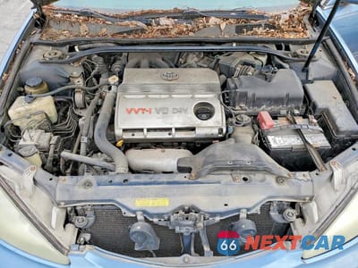Zdjęcie 11 z 12 samochodu: 2003 TOYOTA CAMRY LE V6 VIN:4T1BF32K13U552655 - miniatura