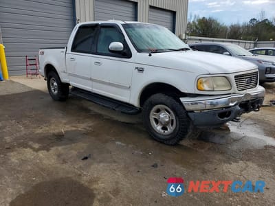 Czwarte zdjęcie samochodu z boku: 2001 FORD F150 SUPERCREW VIN:1FTRW08L51KD68930 - miniatura