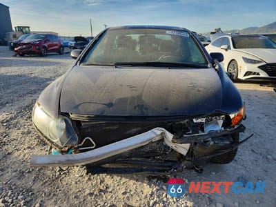 Piąte zdjęcie samochodu w środku: 2007 HONDA CIVIC LX VIN:1HGFA165X7L054478 - miniatura