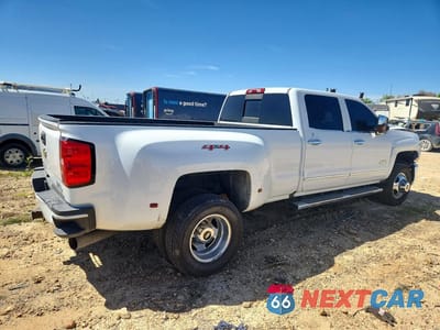 Trzecie zdjęcie samochodu z tyłu: 2017 CHEVROLET SILVERADO K3500 HIGH COUNTRY VIN:1GC4K1EY4HF249670 - miniatura