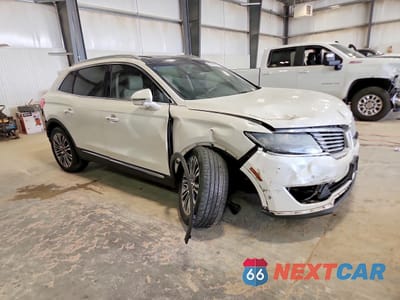 Czwarte zdjęcie samochodu z boku: 2016 LINCOLN MKX RESERVE VIN:2LMTJ6LR8GBL53988 - miniatura