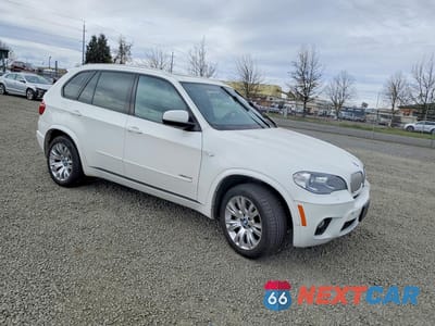 Czwarte zdjęcie samochodu z boku: 2013 BMW X5 XDRIVE50I VIN:5UXZV8C51D0C17255 - miniatura