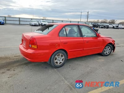 Trzecie zdjęcie samochodu z tyłu: 2003 HYUNDAI ACCENT GL VIN:KMHCG45C73U460199 - miniatura