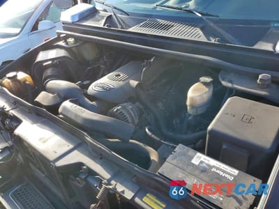 Zdjęcie 12 z 13 samochodu: 2005 HUMMER H2 VIN:5GRGN23U95H102074 - miniatura