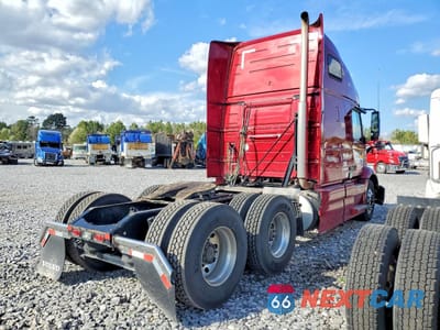 Czwarte zdjęcie samochodu z boku: 2022 VOLVO VNR SEMI TRUCK VIN:4V4WC9EH7NN303604 - miniatura