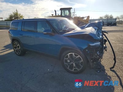 Czwarte zdjęcie samochodu z boku: 2025 RIVIAN R1S ADVENTURE VIN:7PDSGBBA8SN068146 - miniatura