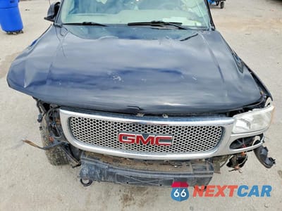Zdjęcie 12 z 13 samochodu: 2003 GMC YUKON DENALI VIN:1GKEK63U93J289318 - miniatura