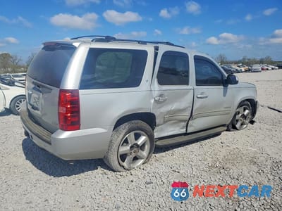 Trzecie zdjęcie samochodu z tyłu: 2011 CHEVROLET TAHOE C1500 LT VIN:1GNSCBE06BR129550 - miniatura