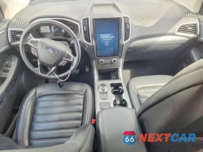 Zdjęcie 8 z 14 samochodu: 2021 FORD EDGE SEL VIN:2FMPK3J93MBA43836 - miniatura