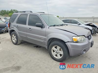 Czwarte zdjęcie samochodu z boku: 2007 FORD ESCAPE HEV VIN:1FMCU49H57KB34479 - miniatura