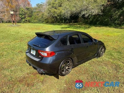 Czwarte zdjęcie samochodu z boku: 2013 SUBARU IMPREZA WRX STI VIN:JF1GR8H61DL206143 - miniatura